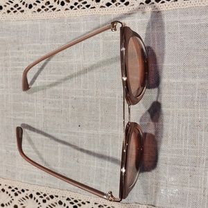 Pink guess sunglasses.